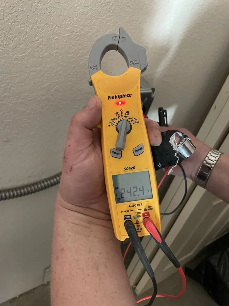 Voltage testing with clamp meter during Hot Tub / Pool Electrical Wiring in Albertville